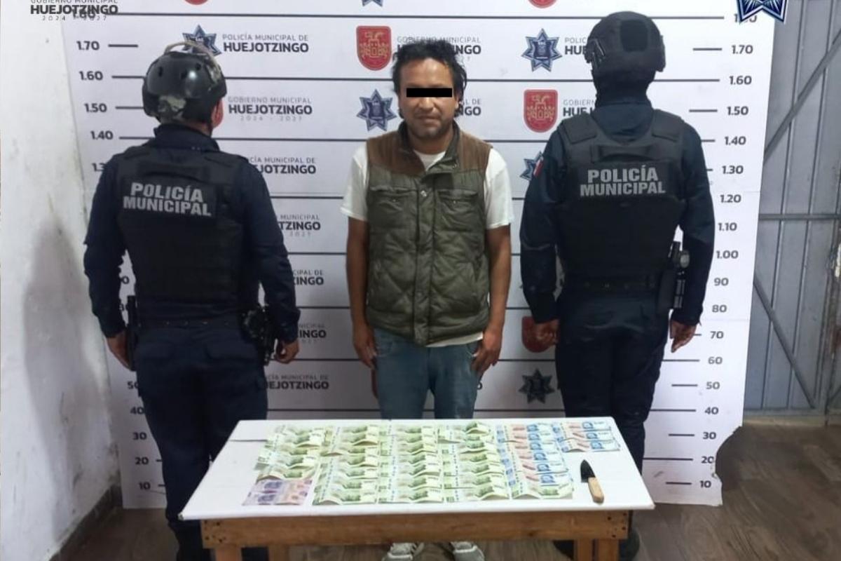 Policías municipales de Huejotzingo frustran intento de robo en hotel y recuperan dinero en efectivo