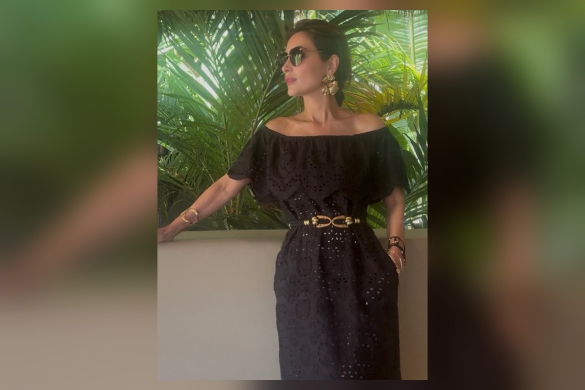Luis Miguel y Paloma Cuevas están en Los Cabos, donde ella lució un vestido negro con escote Bardot | Foto: Cortesía