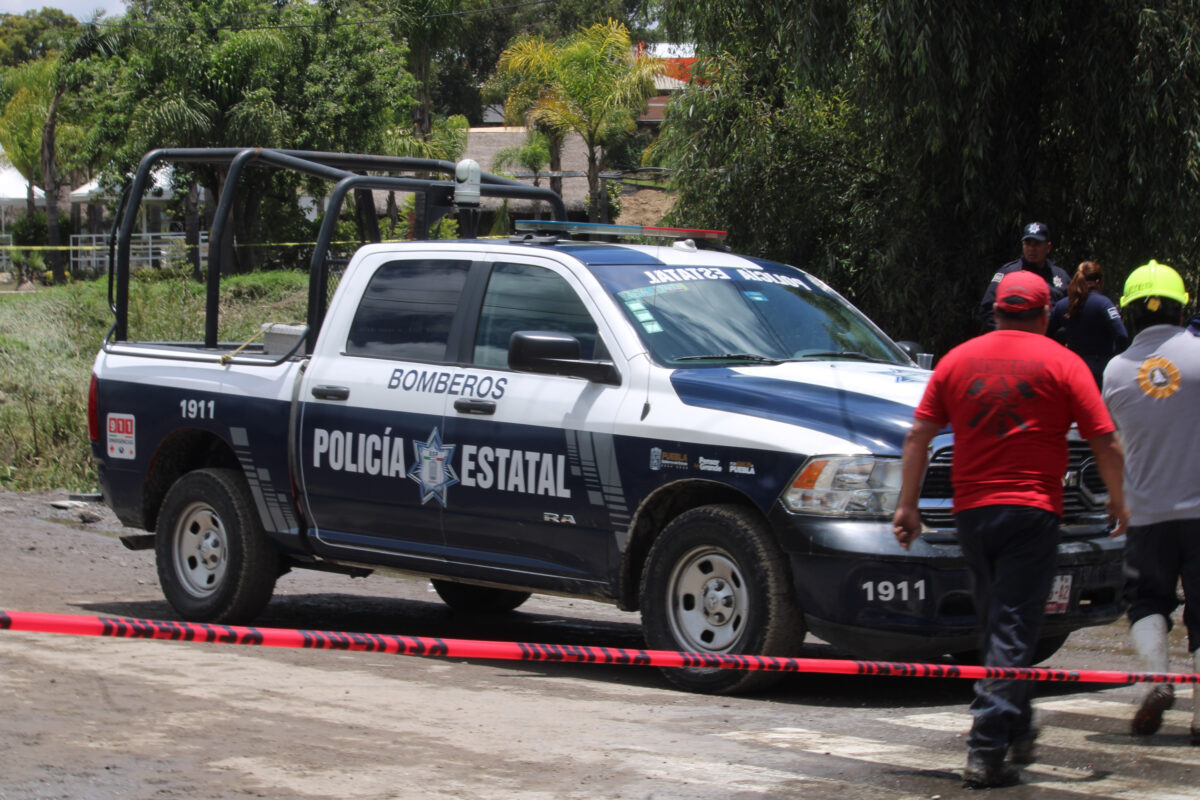 Patrulla de la Policía Estatal y cinta de acordonamiento, imagen ilustrativa del embolsado en Periférico Ecológico | Foto ilustrativa: Agencia Enfoque